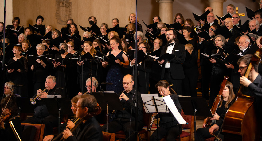 Members of the Commonwealth Chorale performing with full orchestra.
