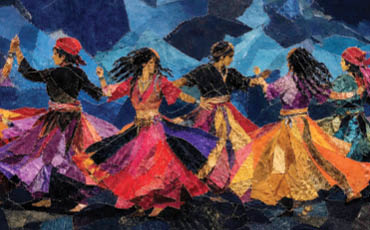 Colorfully dressed dancers whirl hand-in-hand, their flowing skirts creating vibrant movement against a dramatic blue, abstract background.  Image by Axie Breen.
