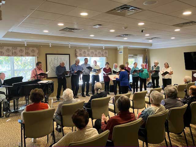 Outreach members perform for residents at a retirement community