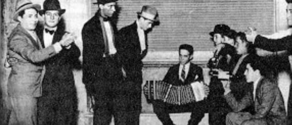 Men in Buenos Aires dance and play tango (ca. 1900)